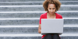 Woman looking at a laptop computer